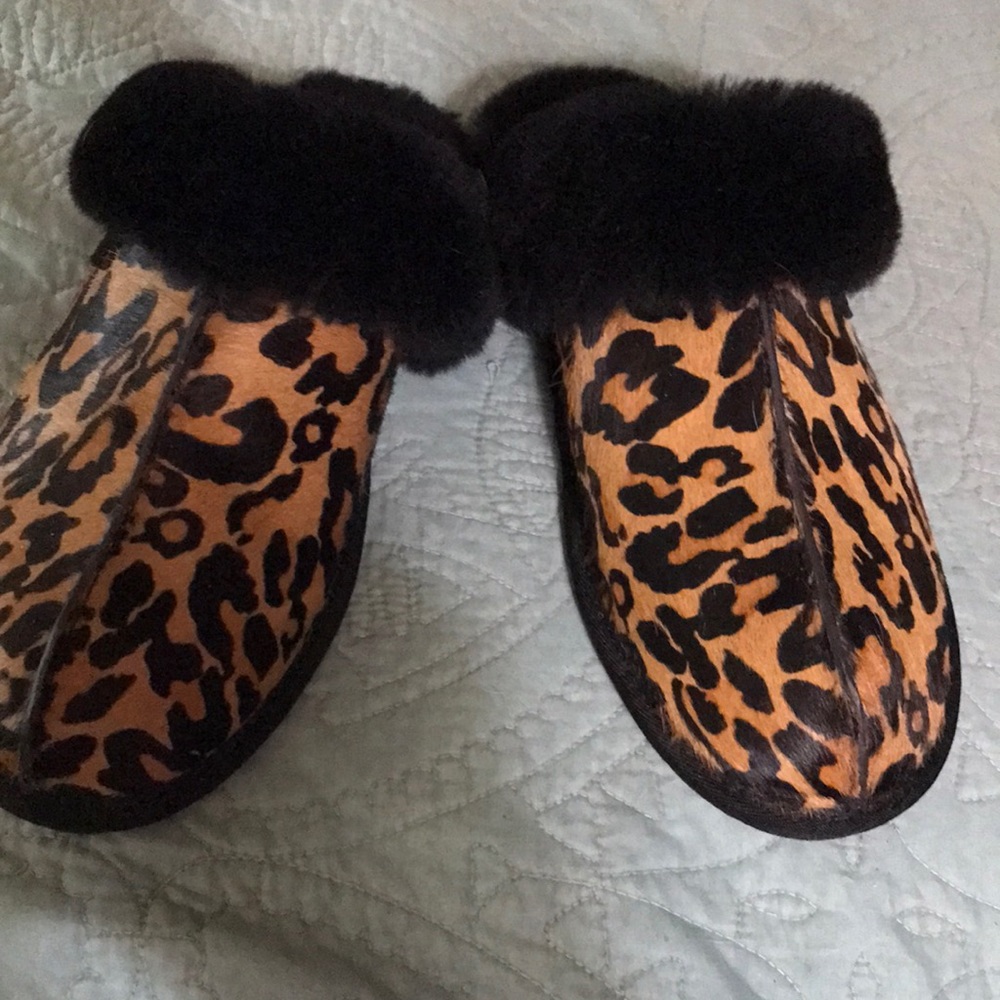 Ugg Slip On Houseshoes. Like new. Worn twice. Black with leopard print
